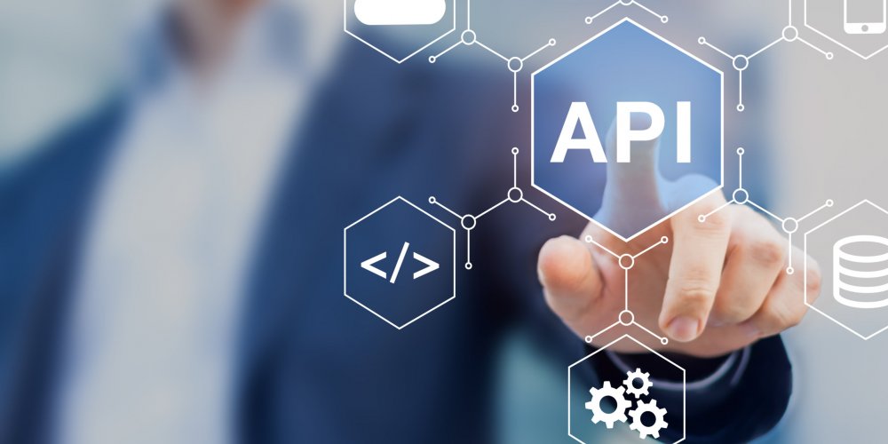 API Application Programming Interface connect services on internet and allow network data communication, software engineer touching concept for IoT, cloud computing, robotic process automation